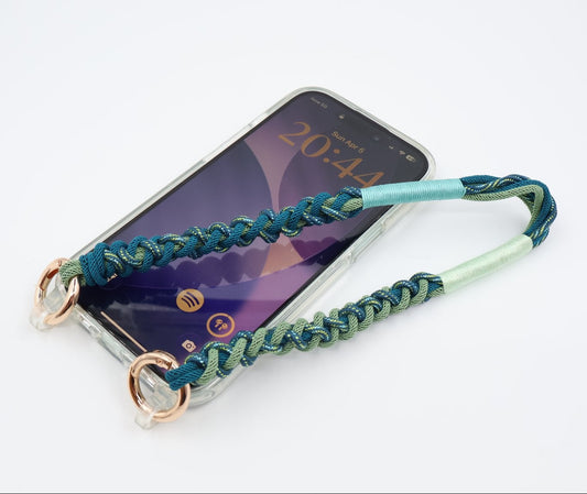 Phone case with a braided strap on a white background
