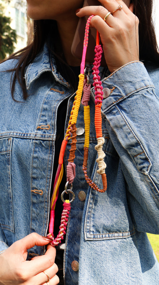 Sunset Rose modular phone strap set — styled flat lay with strap and spring clips