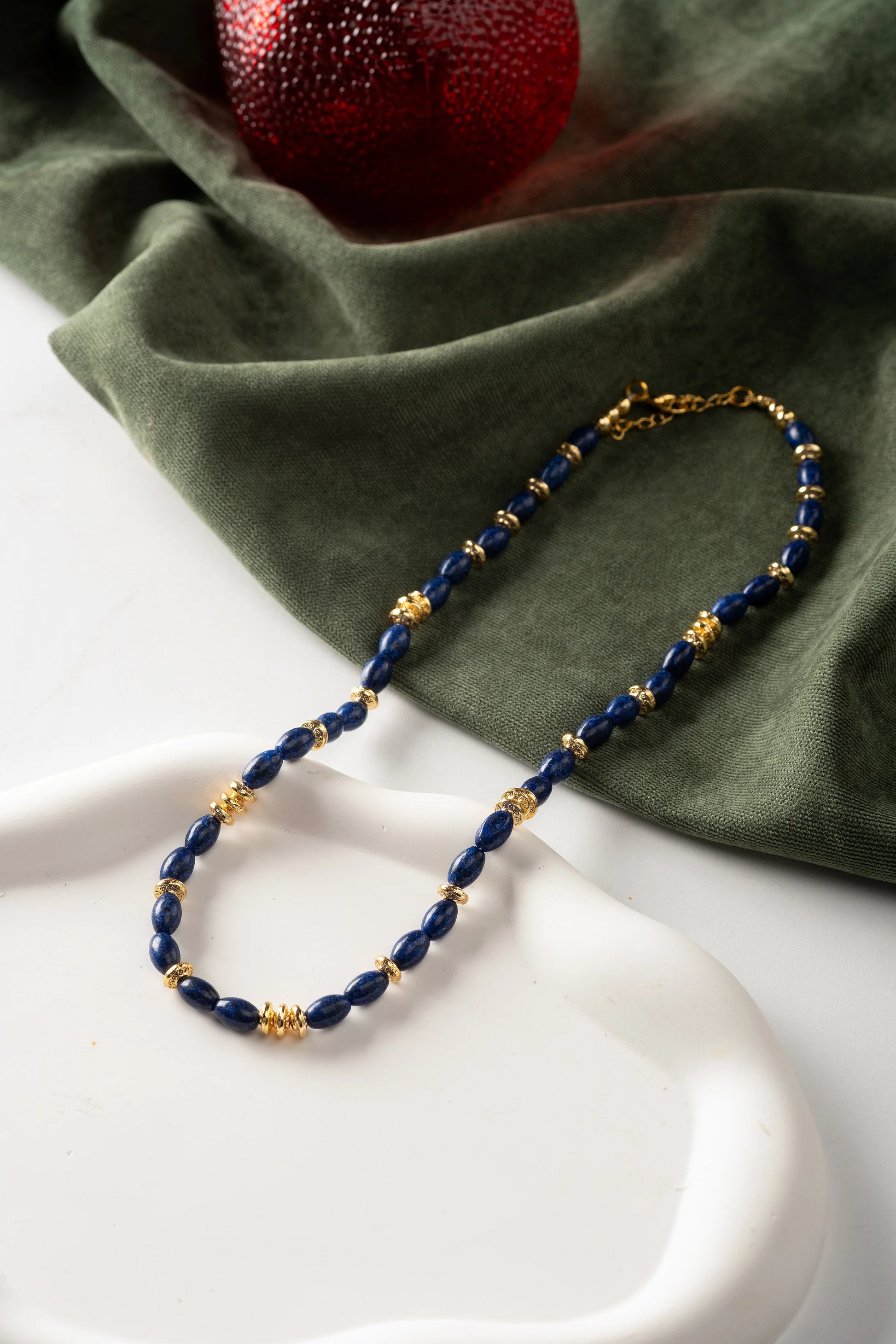 Mirage Lapis Lazuli Necklace displayed on cloth background