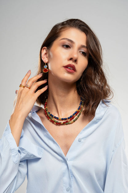 Mirage Lapis Lazuli Necklace worn on model with gold-plated details