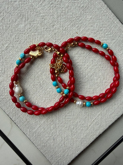 Coralyn Sol Coral Necklace displayed on canvas cloth