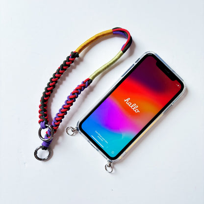 Phone with colorful braided strap on a white background