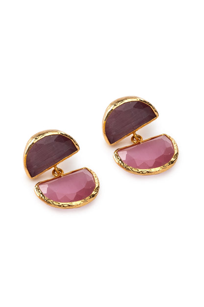 Pair of earrings with pink and gold design on a white background