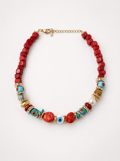 Red Coral devil eye woman necklace.jpeg