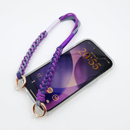 Smartphone with a purple braided strap on a white background