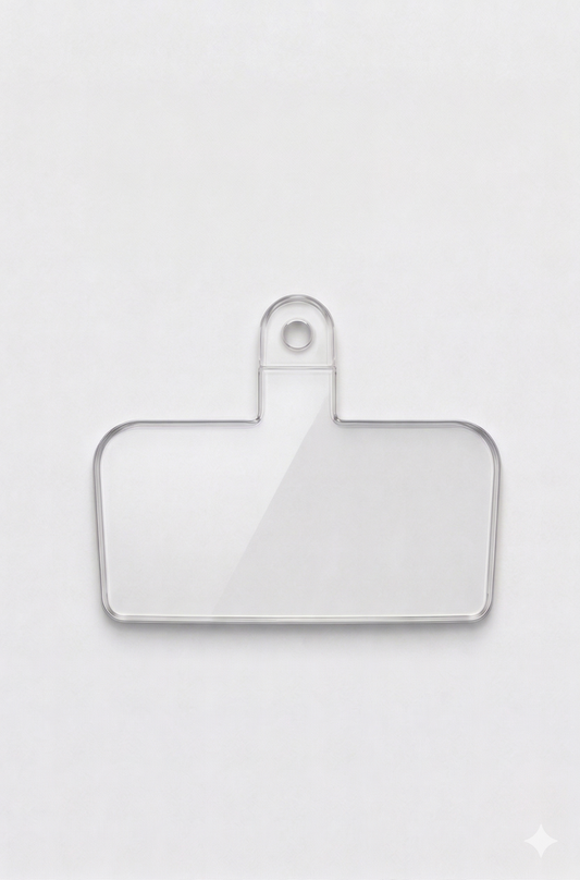 Clear plastic patch on a white background compatible with all phone cases and Charmole phone straps