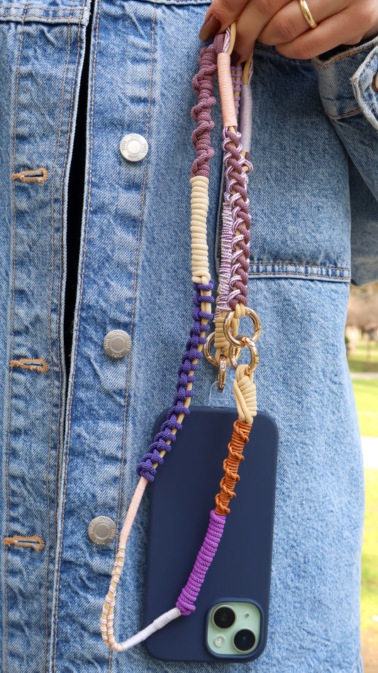 Lilac Haze modular phone strap set — styled flat lay with strap and spring clips