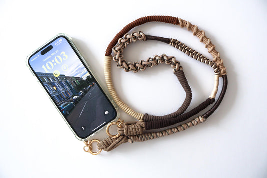 Sienna Ridge hand-knotted macrame crossbody strap with a brown and gold milan cords on a white background